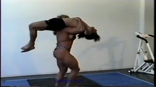 | Female Bodybuilder Karla Nelson Humiliates Male With Scissors, Lifts And Carries, Shoolgirl Pins, Facesits